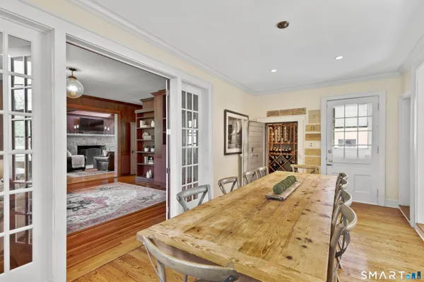 a view of a livingroom with furniture and an empty room