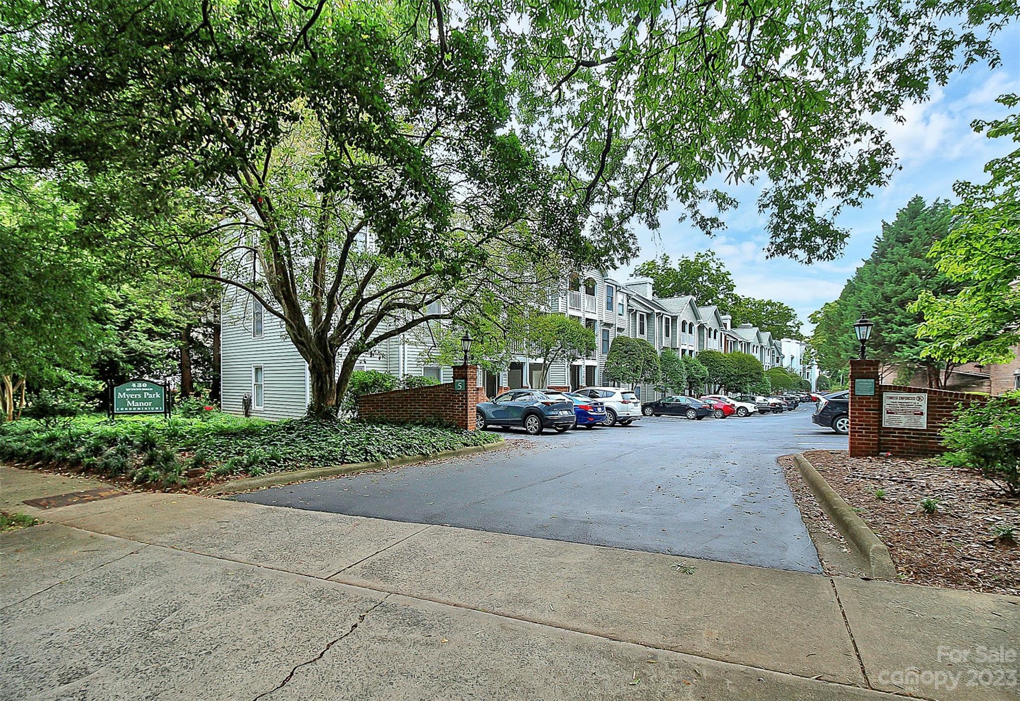 430 Queens Road, Unit 212 Charlotte, NC 28207 - Photo 21 of 23 a view of a house with a outdoor space