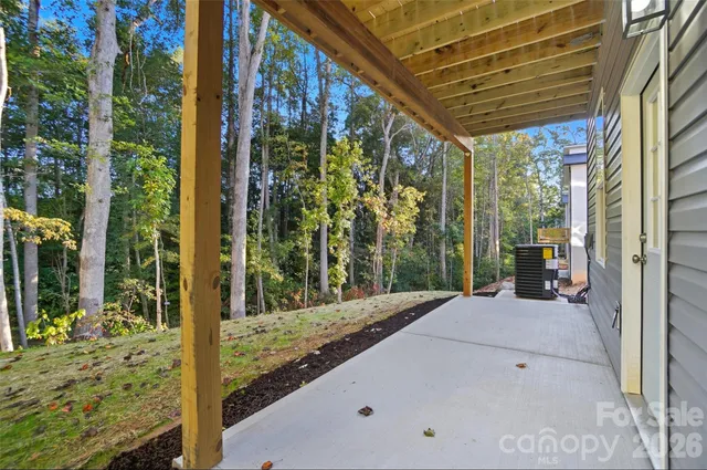 a view of backyard with green space