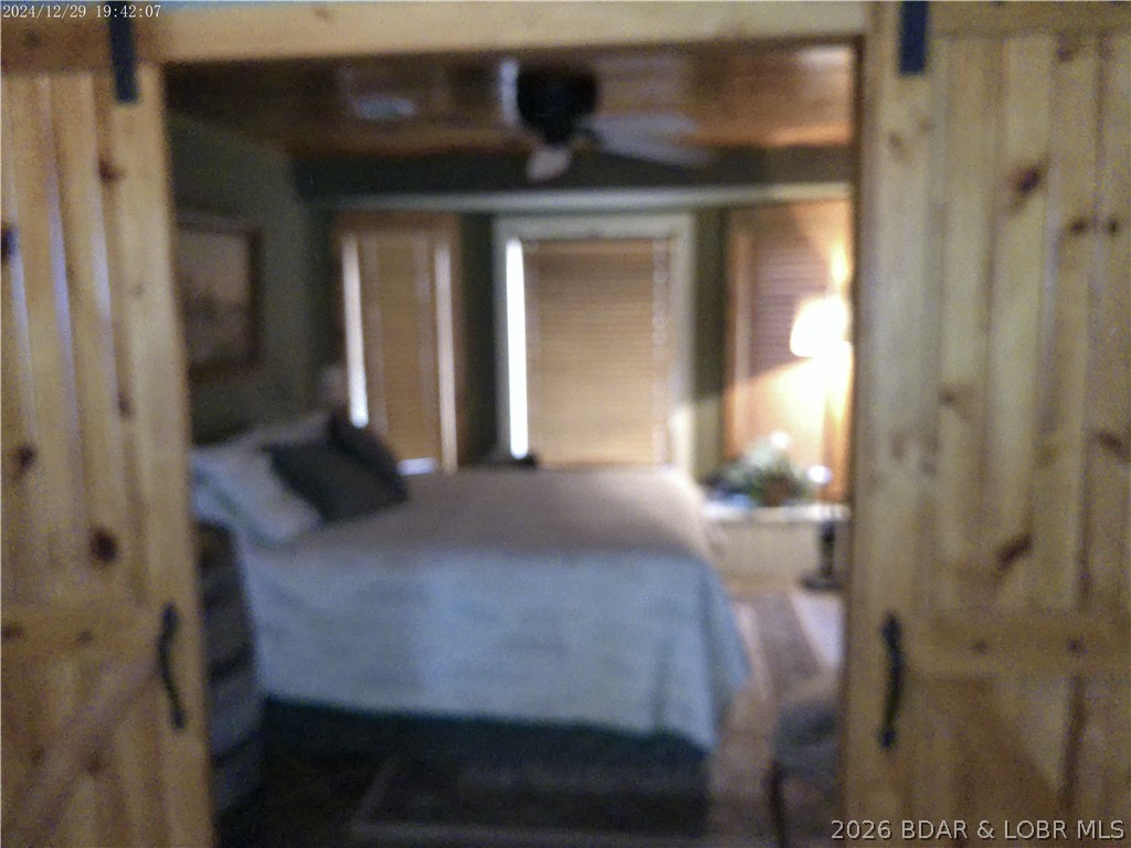 1814 Sagrada Road Edwards, MO 65326 - Photo 43 of 62 3rd BEDROOM has large Bay Window to Awesome Lake V