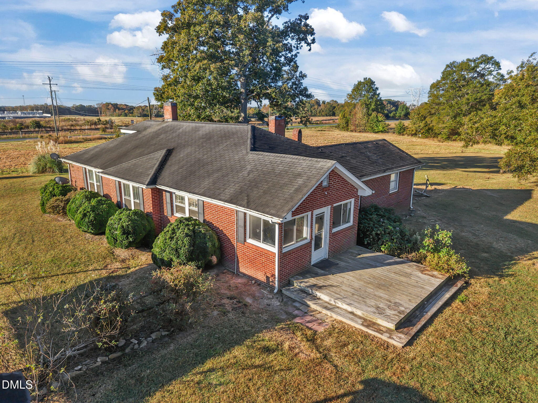 8794 Old 421 Road Julian, NC 27283 - Photo 11 of 24 an aerial view of multiple houses with a yard