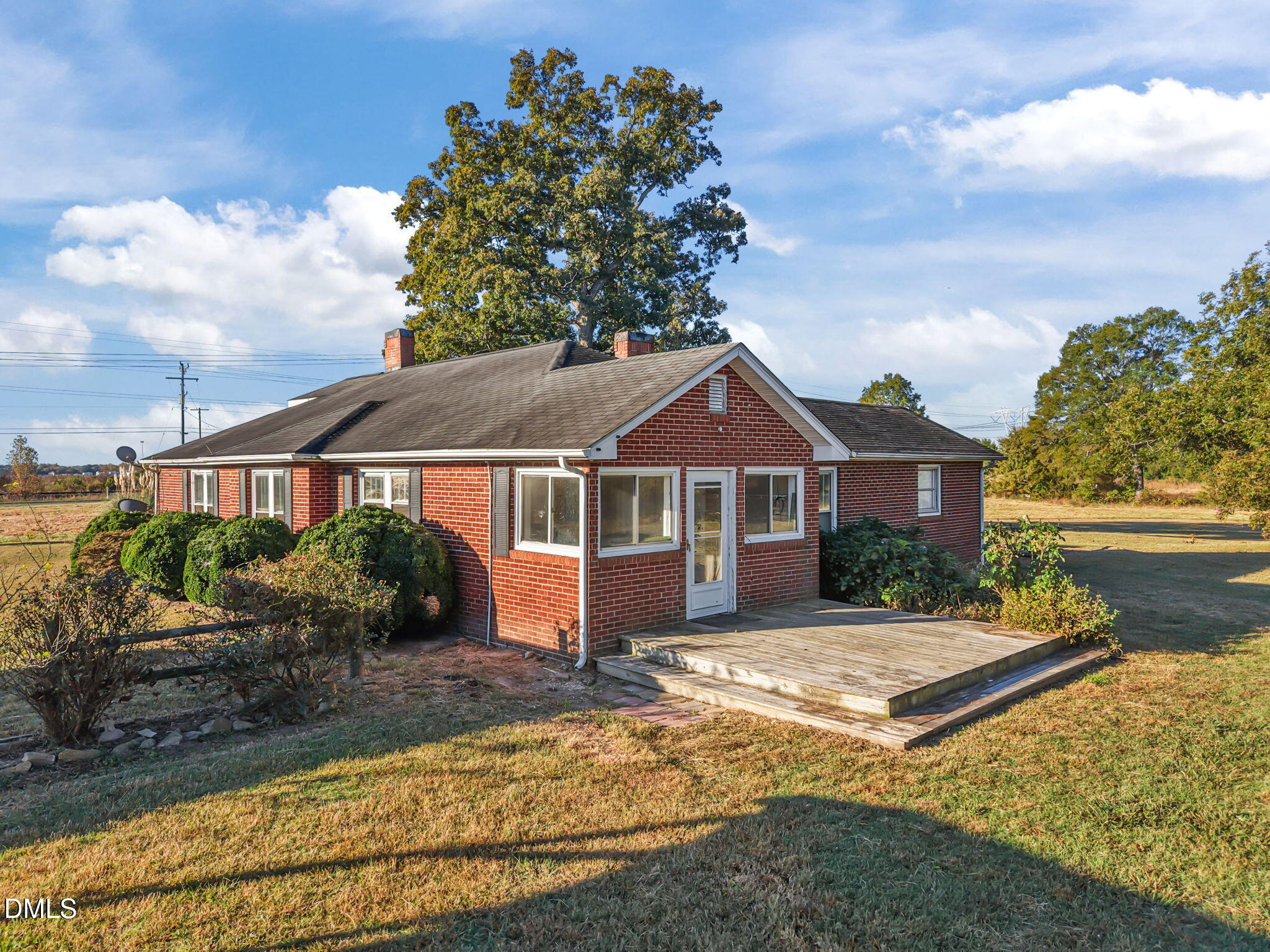 8794 Old 421 Road Julian, NC 27283 - Photo 12 of 24 a front view of a house with a yard