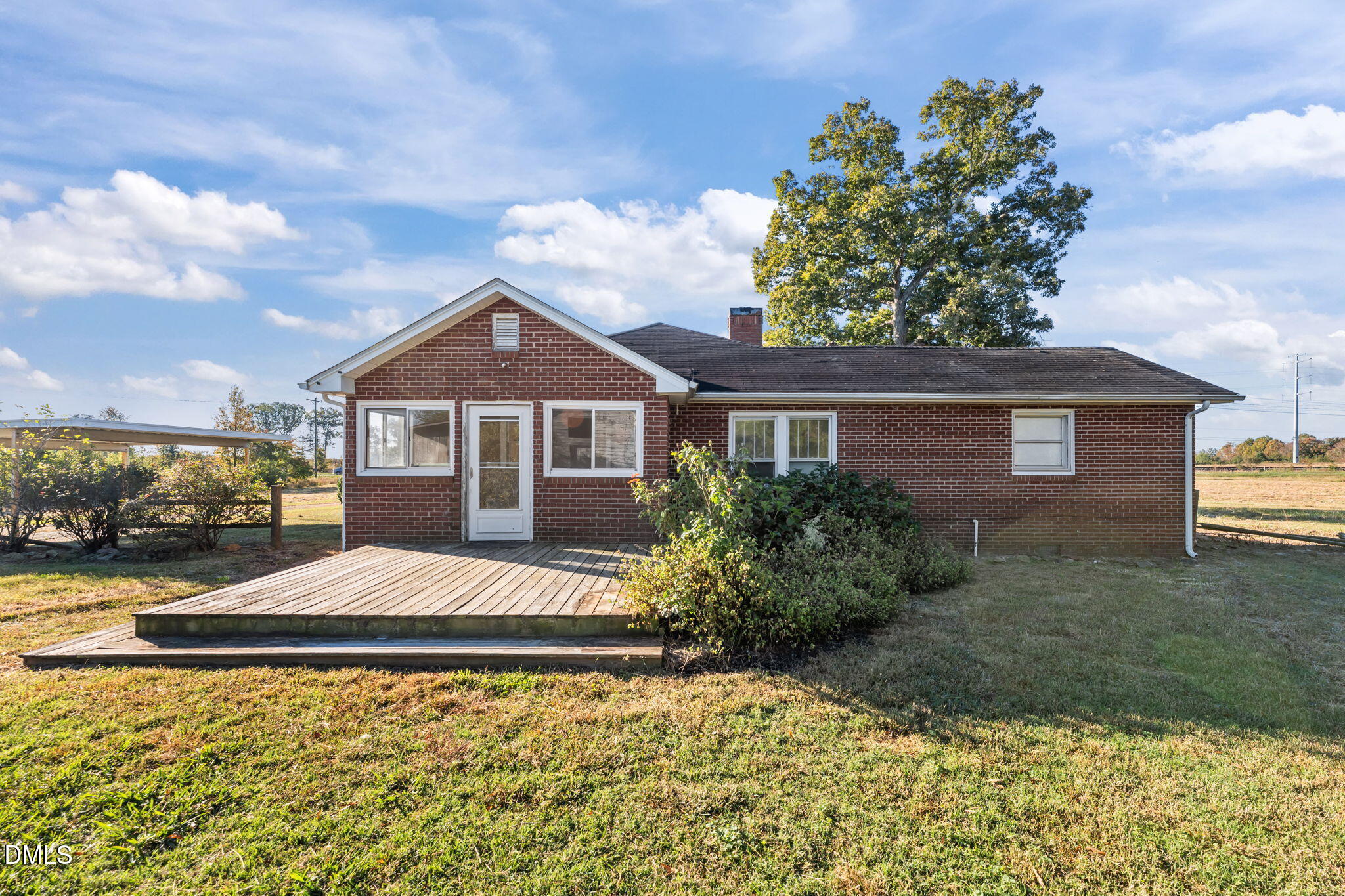 8794 Old 421 Road Julian, NC 27283 - Photo 7 of 24 a front view of a house with a yard