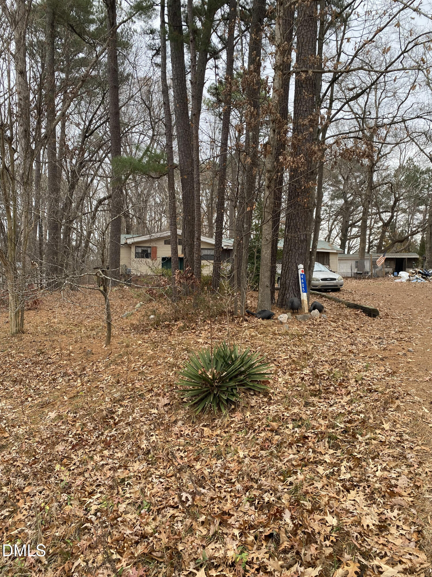 4605 Graham Newton Road Raleigh, NC 27606 - Photo 2 of 10 a backyard of a house with lots of green space