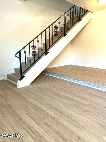 38710 10th Street East, Unit 12 Palmdale, CA 93550 - Photo 9 of 23 a view of balcony with wooden floor