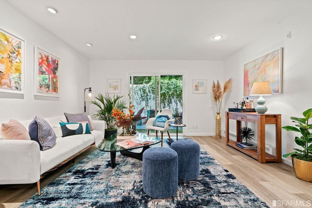 4096 17th Street, Unit 109 San Francisco, CA 94114 - Photo 1 of 32 a living room with furniture and a fireplace