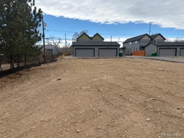 a view of a house with a sink and yard