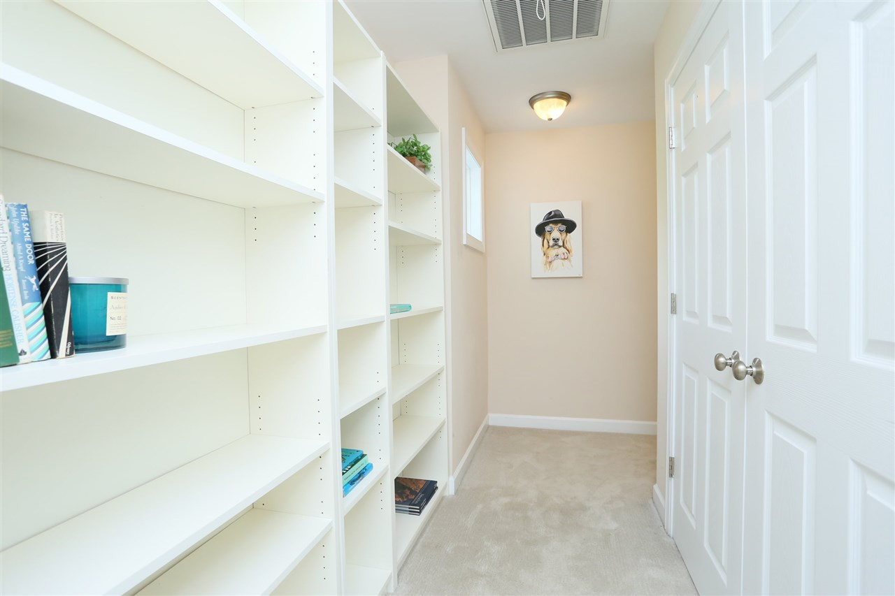 8915 Shallcross Way Raleigh, NC 27617 - Photo 19 of 29 Upstairs Hallway