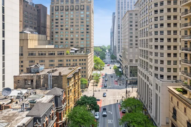 a view of a city with tall buildings