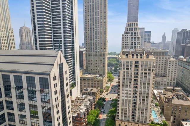 a view of a city with tall buildings