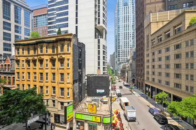 a view of a building from a balcony