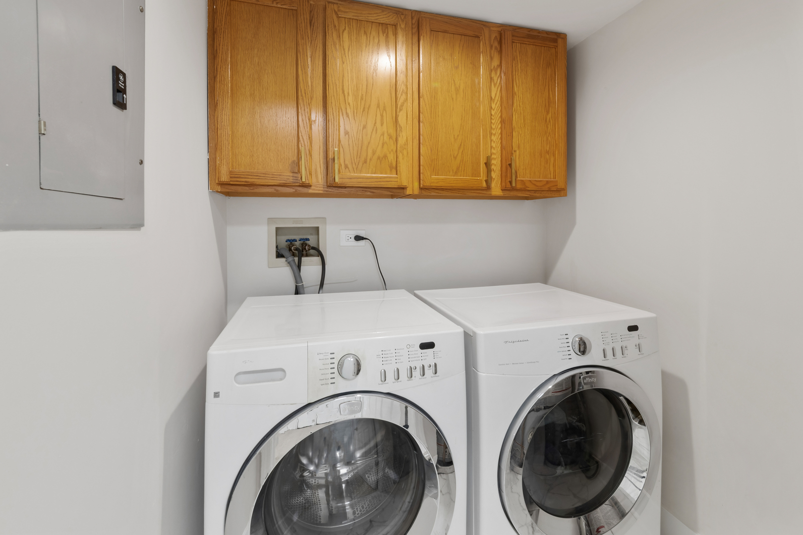18310 Robin Lane, Unit D2 Homewood, IL 60430 - Photo 16 of 17 a utility room with dryer and washer