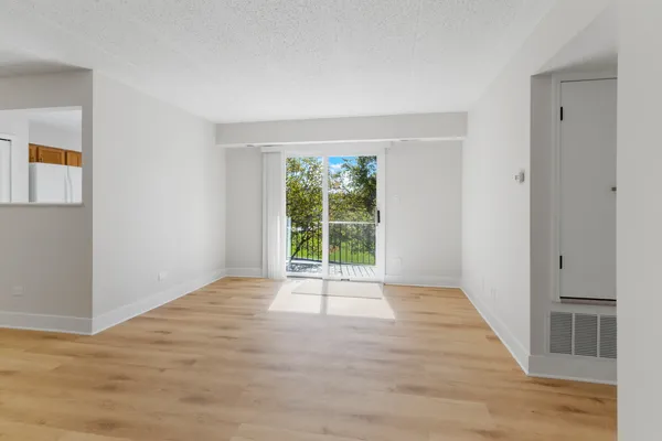 a view of an empty room and window
