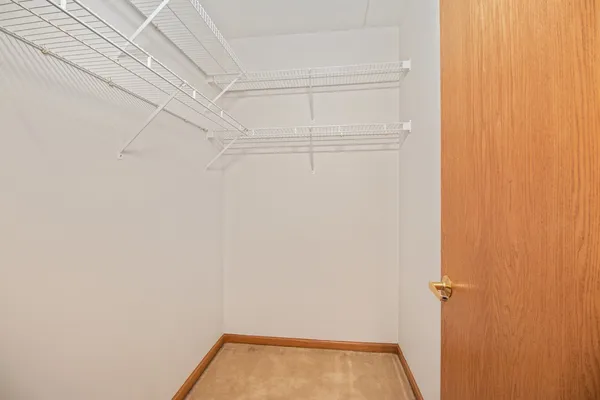 a view of a room with racks on the wall