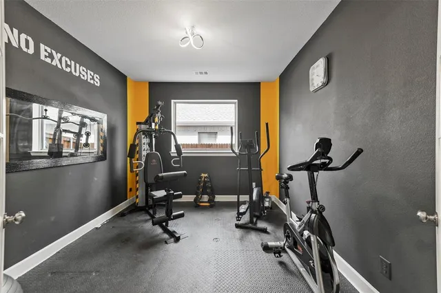 a view of a room with gym equipment