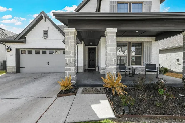 a view of house with patio