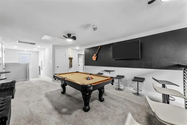 a room with furniture and a flat screen tv