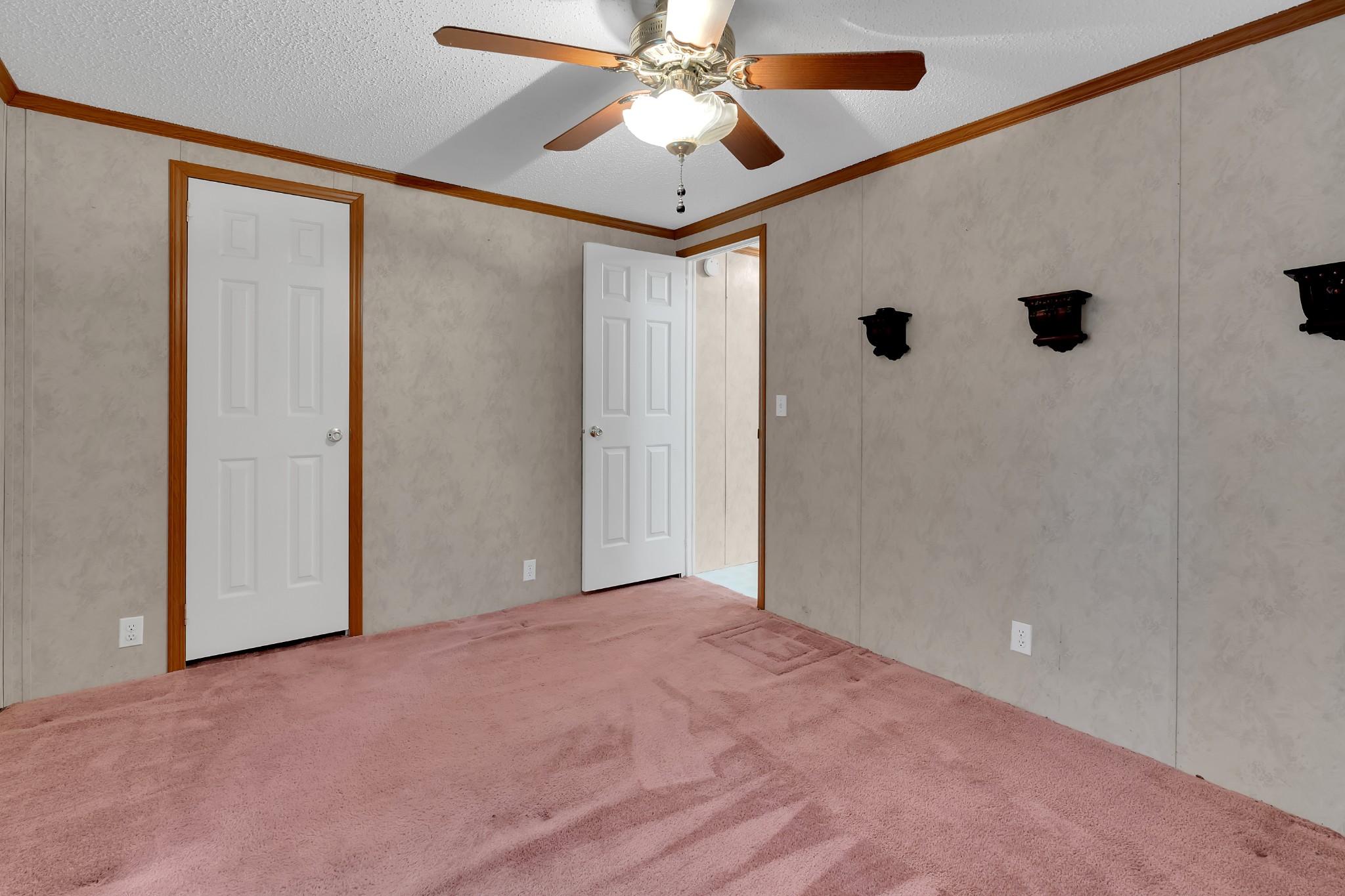 2635 Pete Sain Road Manchester, TN 37355 - Photo 15 of 52 a view of an empty room with a ceiling fan