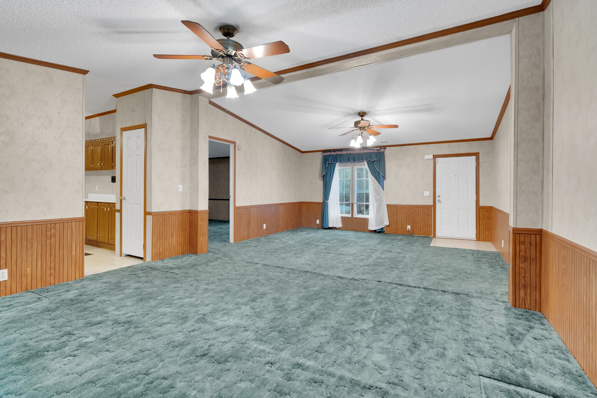 2635 Pete Sain Road Manchester, TN 37355 - Photo 31 of 52 a view of a livingroom with a ceiling fan and window