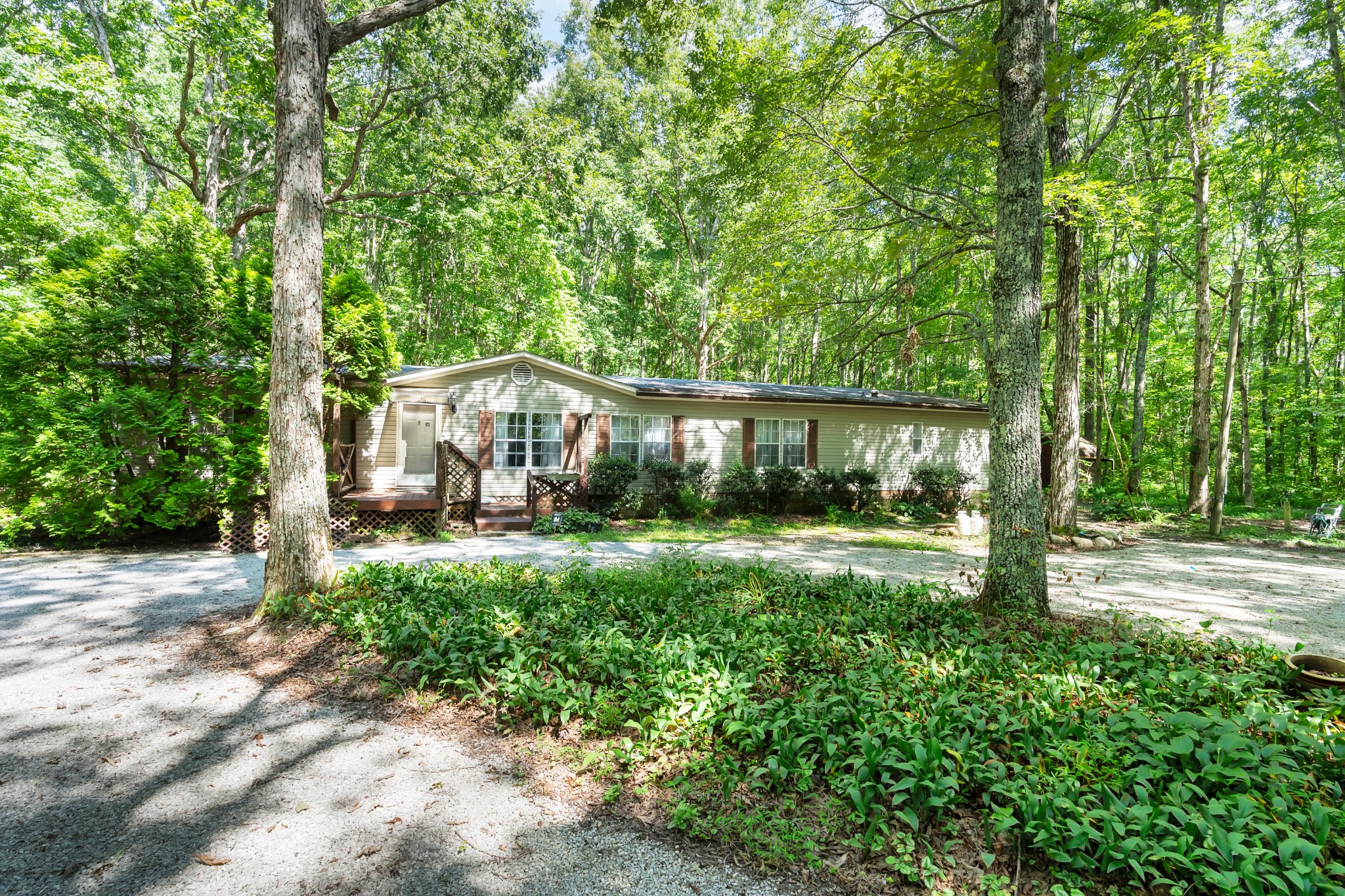 2635 Pete Sain Road Manchester, TN 37355 - Photo 5 of 52 a house view with a garden space