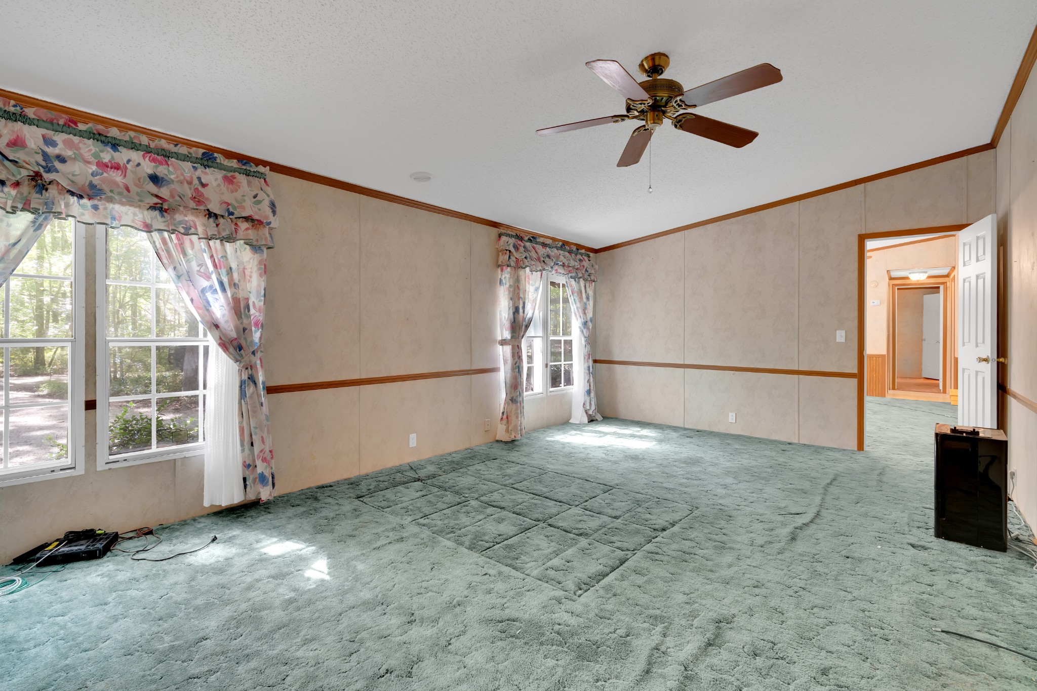 2635 Pete Sain Road Manchester, TN 37355 - Photo 8 of 52 a view of empty room with wooden floor and fan