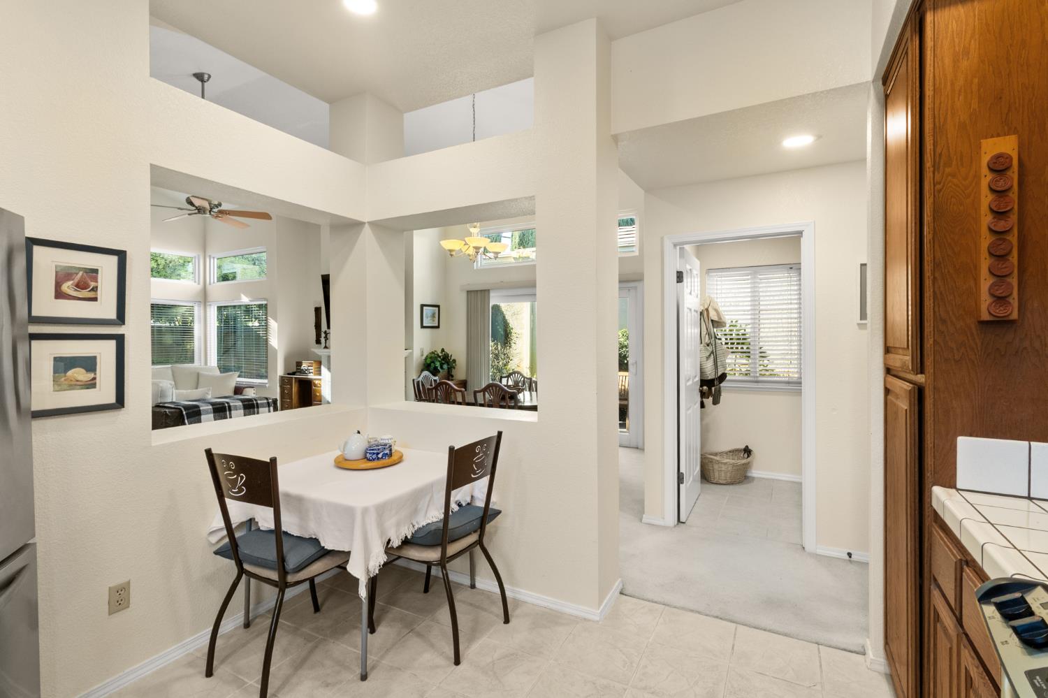1153 Copper Lantern Court Modesto, CA 95355 - Photo 12 of 37 a view of a dining room with furniture and a table