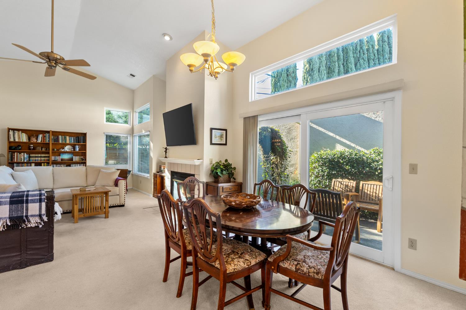 1153 Copper Lantern Court Modesto, CA 95355 - Photo 13 of 37 a view of a dining room with furniture window and outside view