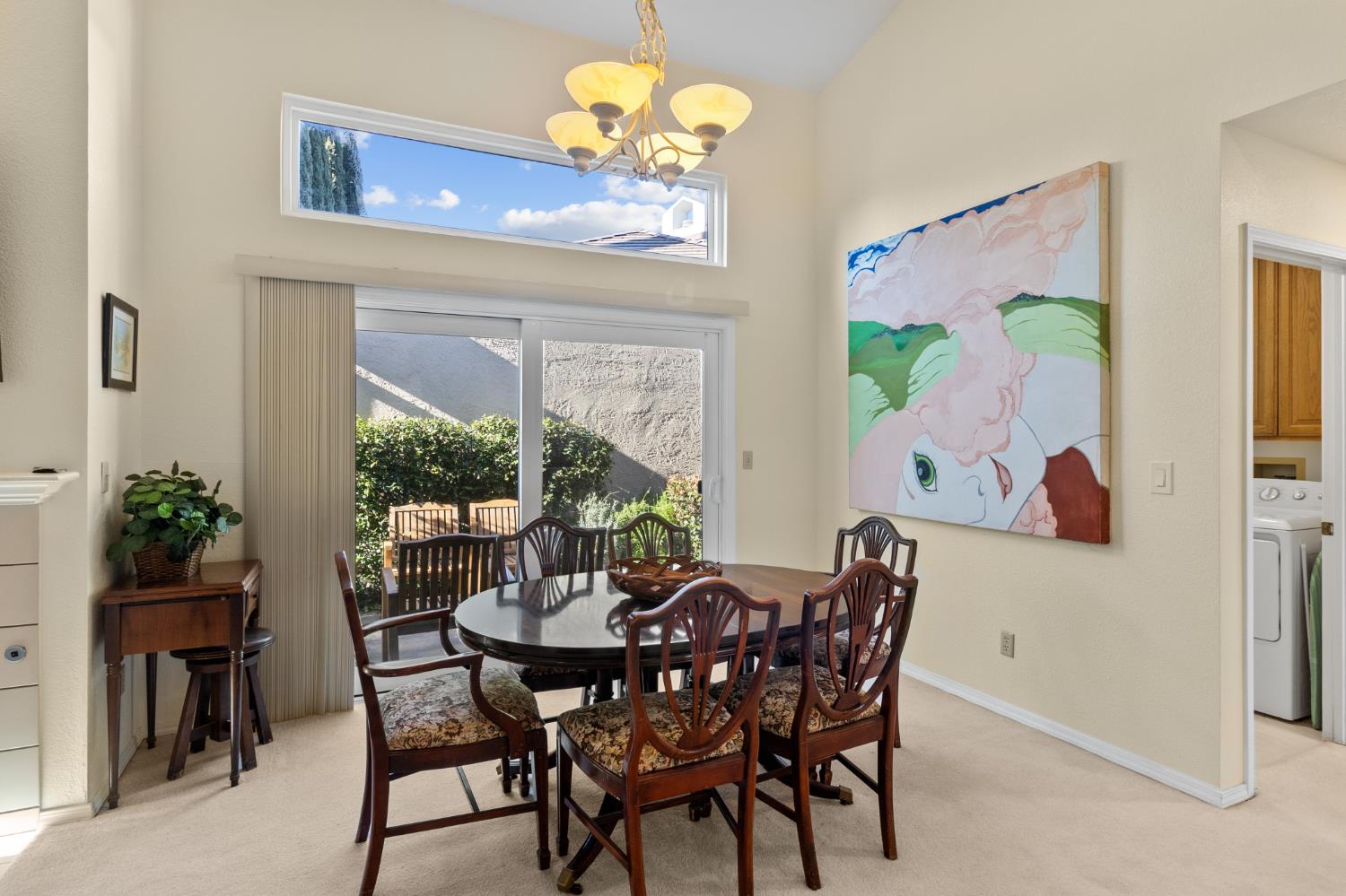 1153 Copper Lantern Court Modesto, CA 95355 - Photo 16 of 37 a view of a dining room with furniture window and outside view