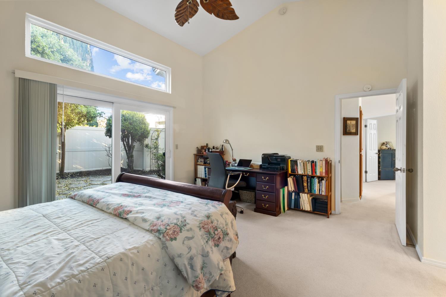 1153 Copper Lantern Court Modesto, CA 95355 - Photo 23 of 37 a bedroom with furniture and a large window
