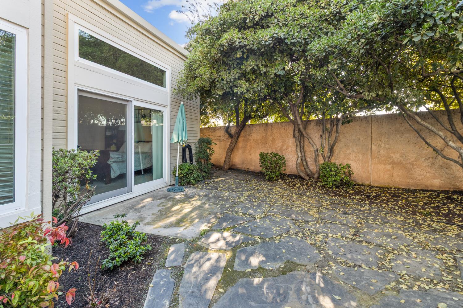 1153 Copper Lantern Court Modesto, CA 95355 - Photo 29 of 37 a view of a house with a yard