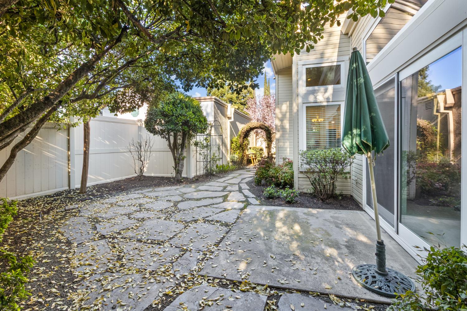 1153 Copper Lantern Court Modesto, CA 95355 - Photo 31 of 37 a view of a house with a yard