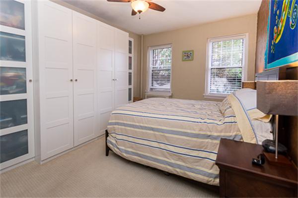 8 Chiswick Road, Unit 7 Boston, MA 02135 - Photo 10 of 18 a bedroom with a bed and a desk