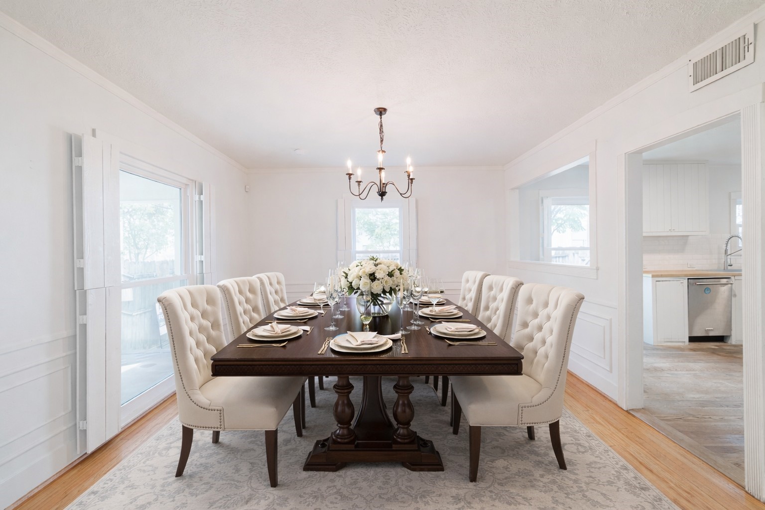 2438 Albans Road Houston, TX 77005 - Photo 11 of 34 a view of a dining room with furniture and chandelier