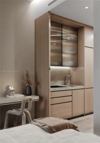 a living room with a bed and furniture