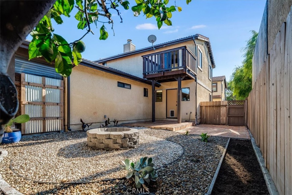 436 South Oak Park Boulevard, Unit 8 Grover Beach, CA 93433 - Photo 21 of 26 a view of a house with backyard and sitting area