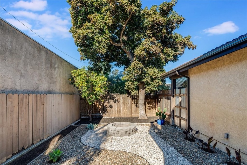 436 South Oak Park Boulevard, Unit 8 Grover Beach, CA 93433 - Photo 22 of 26 a view of a backyard with plants