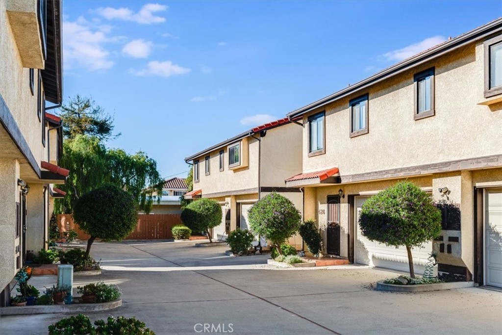 436 South Oak Park Boulevard, Unit 8 Grover Beach, CA 93433 - Photo 23 of 26 a view of a building with a street