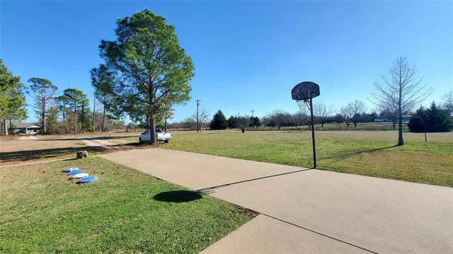 a fire hydrant in the middle of a field