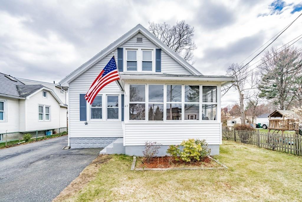 47 Richelieu Street Chicopee, MA 01020 - Photo 3 of 34 a front view of a house with a yard
