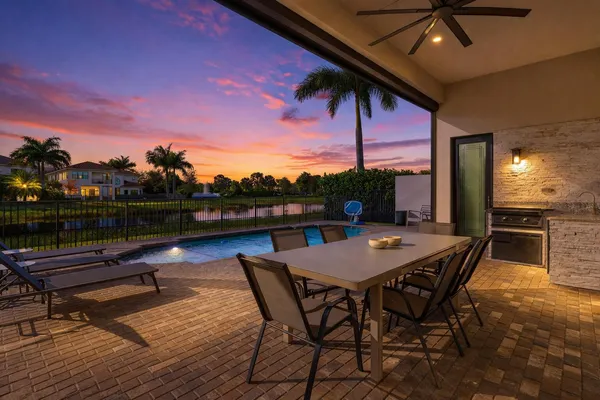 a view of a lake with houses in the back