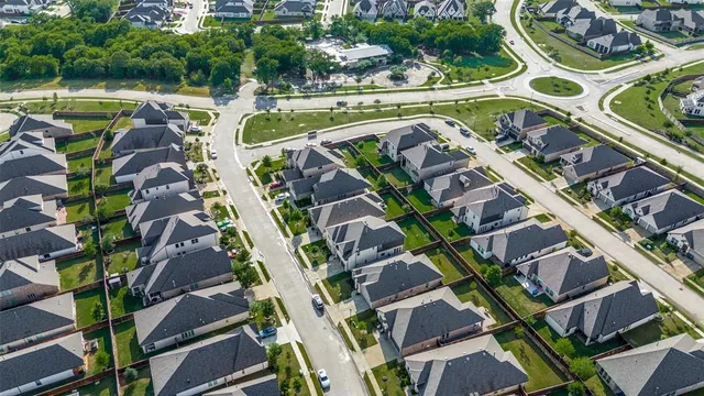 aerial view of a house with a lake view
