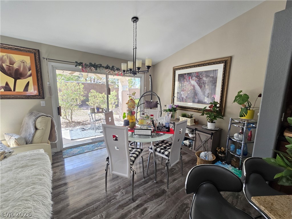 415 Golden State Street Henderson, NV 89012 - Photo 3 of 11 Sliding glass doors connect the casual dining area directly to the private backyard patio.