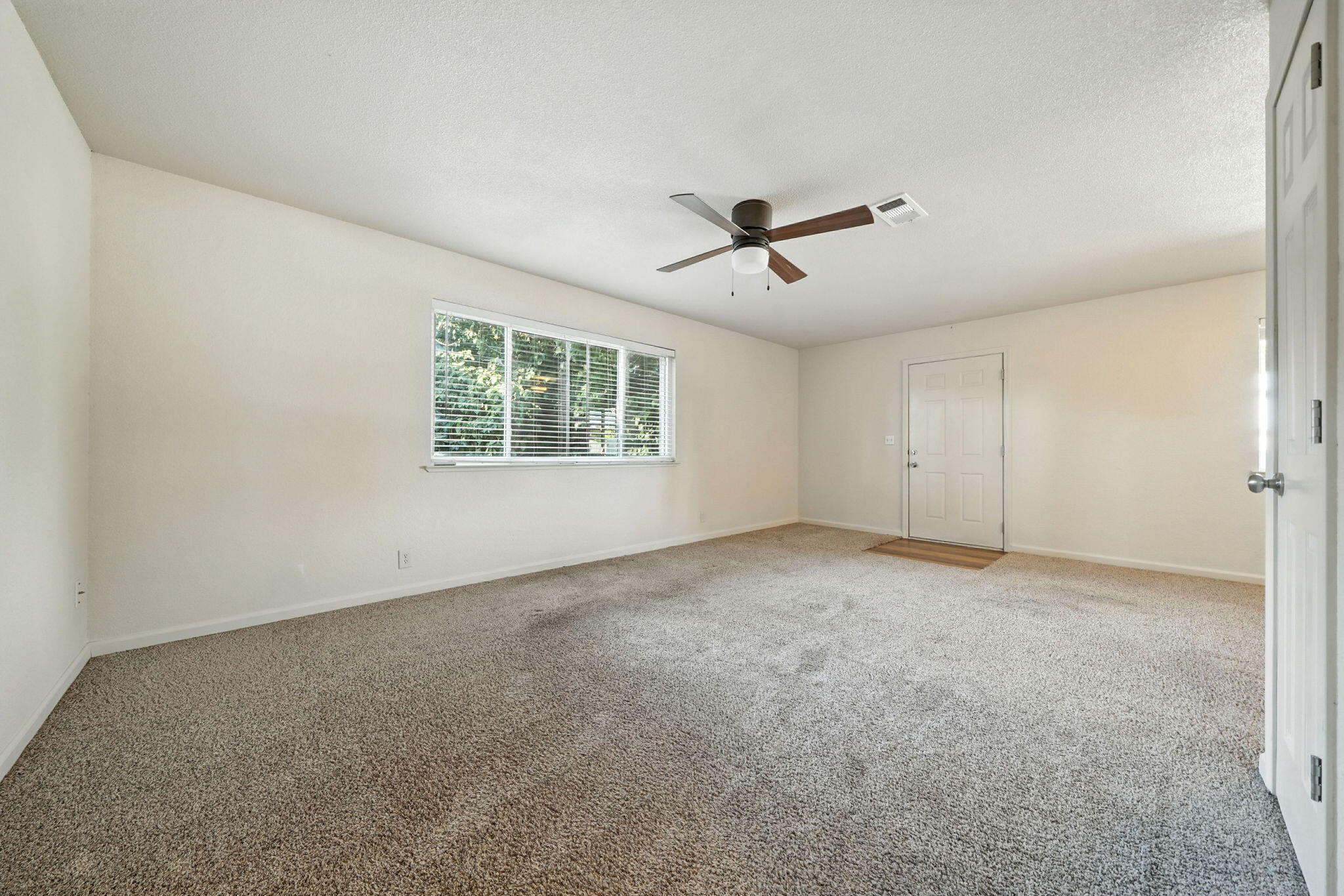 810 Ashmount Avenue Red Bluff, CA 96080 - Photo 5 of 21 a view of an empty room with a window
