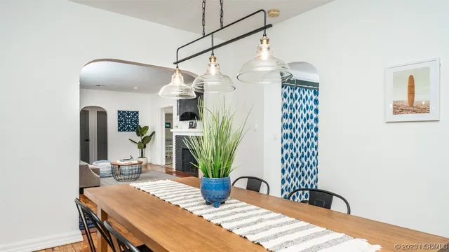 a bedroom with a bed and a television