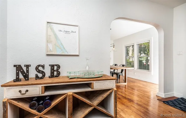 a bathroom with a sink a mirror and shower