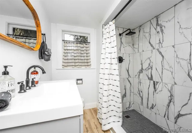 a reading room with furniture and a window