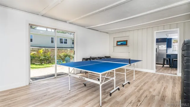 a view of a swimming pool with a yard