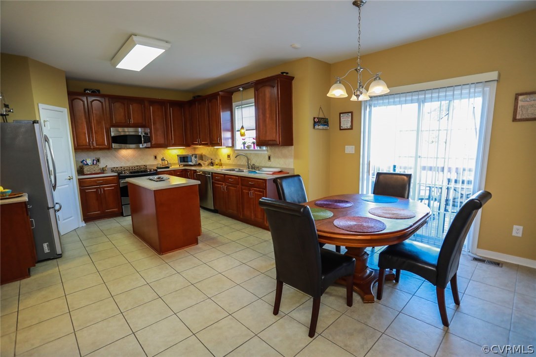 3006 Burley Ridge Terrace Chester, VA 23831 - Photo 12 of 37 a view of a dining room with furniture