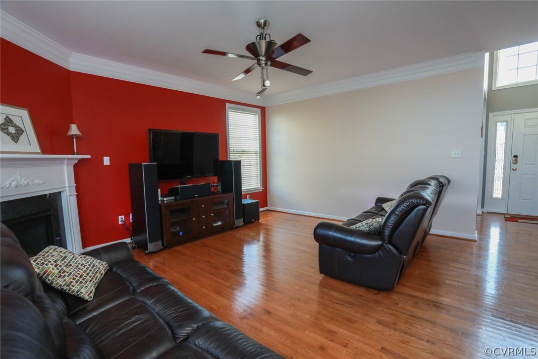3006 Burley Ridge Terrace Chester, VA 23831 - Photo 18 of 37 a living room with furniture and a flat screen tv