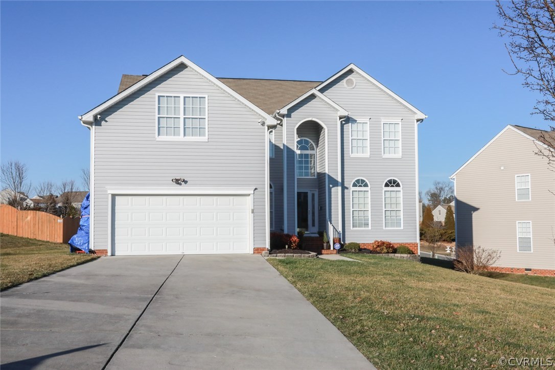 3006 Burley Ridge Terrace Chester, VA 23831 - Photo 29 of 37 a front view of a house with a yard